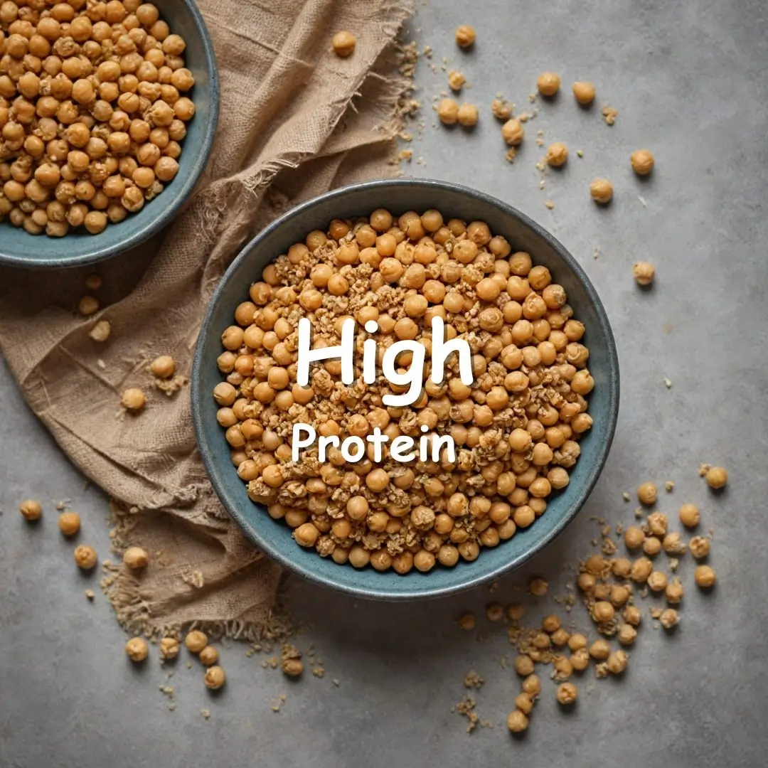 A bowl of chickpeas and granola on a rustic surface, symbolizing a high-protein meal option.